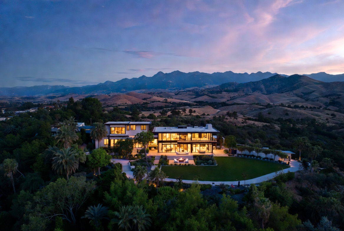 Private event estate at dusk with twilight pool